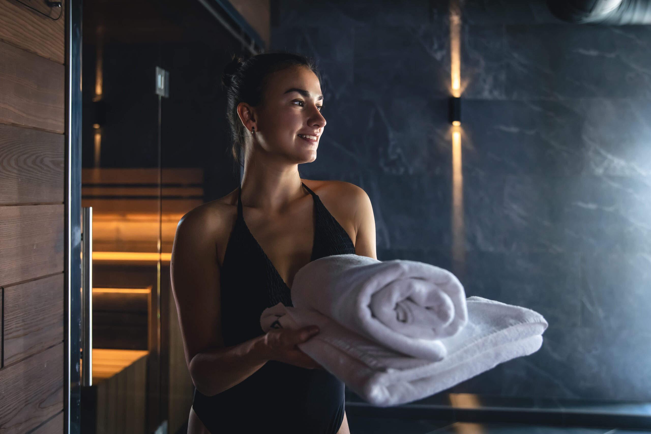 A Young Woman Having Rest In Sauna Alone Scaled